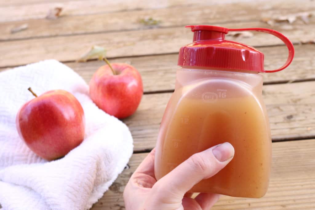 The best homemade apple syrup! This takes less than 5 minutes to make and uses ingredients you already have on hand. Paired with homemade whole wheat pancakes, and this makes a delicious meal. It's a great way to use up leftover apple juice! This would also make great neighbor Christmas gifts or gifts year round.