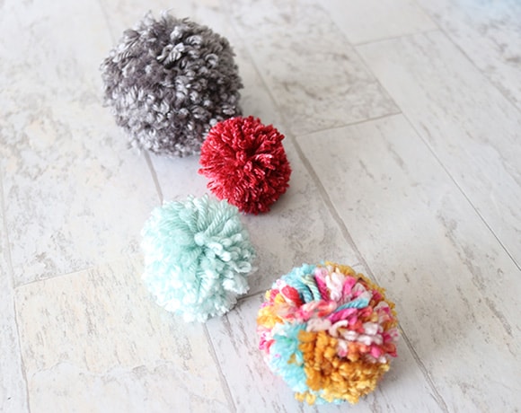 Make your own puffy flower keychain easily with this pom pom maker