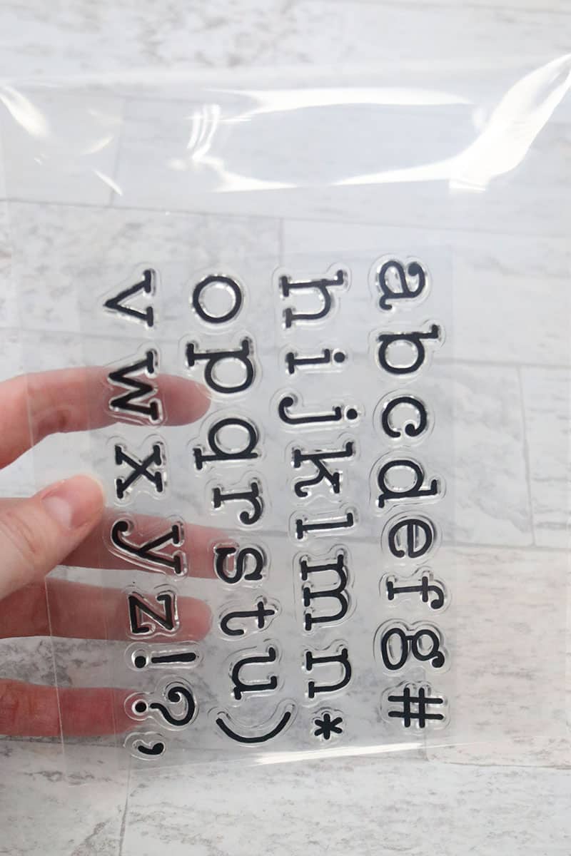 clear alphabet stamp set in clear storage pocket