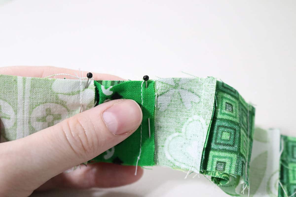 matching up seams on green fabric