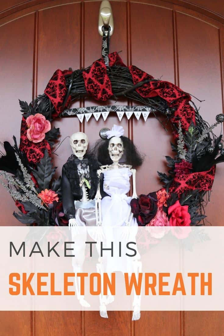 Make this bride and groom skeleton wreath for Halloween! Dress up your front door this fall with a macabre grapevine wreath, made complete with romantic florals, a skeleton couple, and a "just dead" banner! Makes a fun Halloween wedding gift!