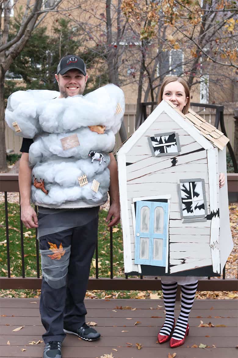 These Wizard of Oz Halloween costumes aren't the typical ones you see over and over! Learn how to make this Wicked Witch of the East and tornado couples costumes--from a box and a laundry hamper! A fun Halloween DIY. 