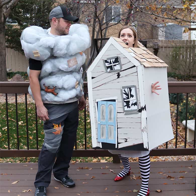 These Wizard of Oz Halloween costumes aren't the typical ones you see over and over! Learn how to make this Wicked Witch of the East and tornado couples costumes--from a box and a laundry hamper! A fun Halloween DIY. 