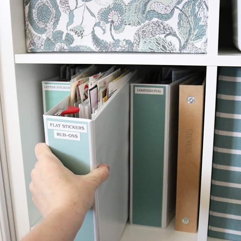 This is the best way to organize stickers! DIY sticker storage binders keep scrapbook and planner stickers organized by categories. Cheap, easy, and compact craft room storage! 
