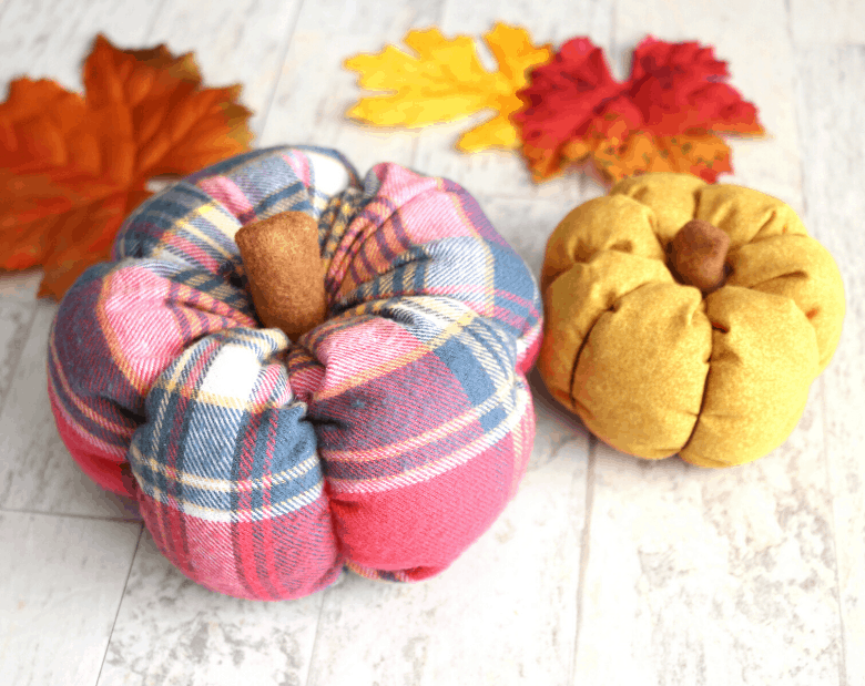 These DIY fabric pumpkins make great fall decor that's cute and cheap! They're a great way to use up fabric scraps!
