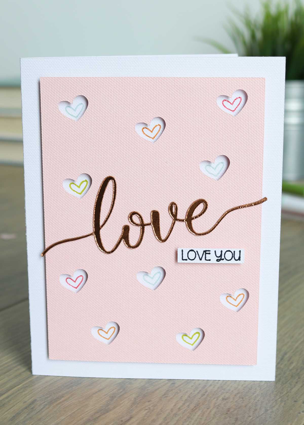 cricut valentines day card ideas: cutout hearts love you card