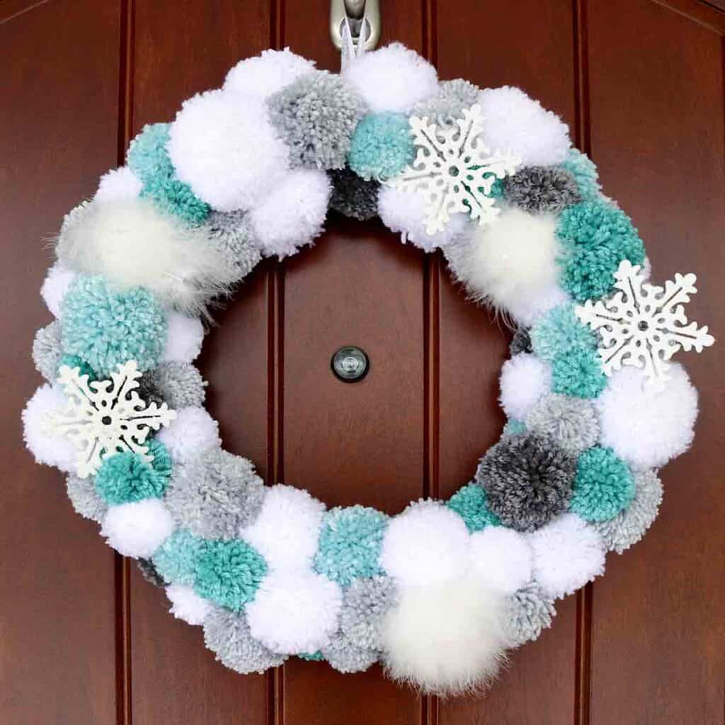 diy winter pom pom wreath tutorial