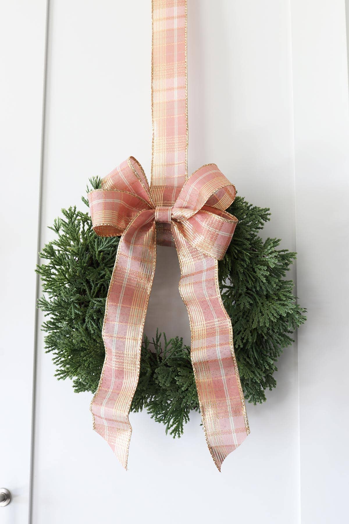 blush pink and gold ribbon bow on kitchen wreath