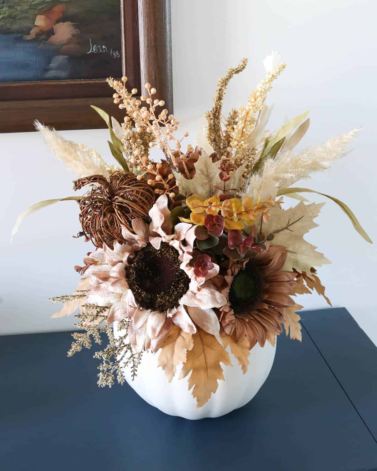 easy floral centerpiece in a faux pumpkin