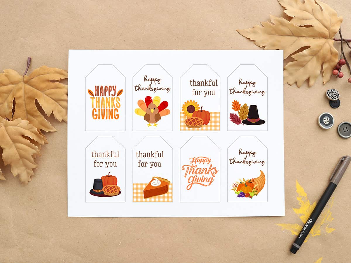 happy thanksgiving gift tag printable on kraft paper background with leaves and buttons