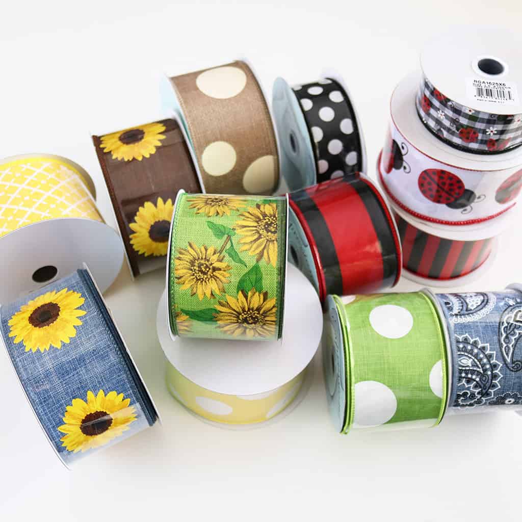 rolls of sunflower and summer themed wired ribbon