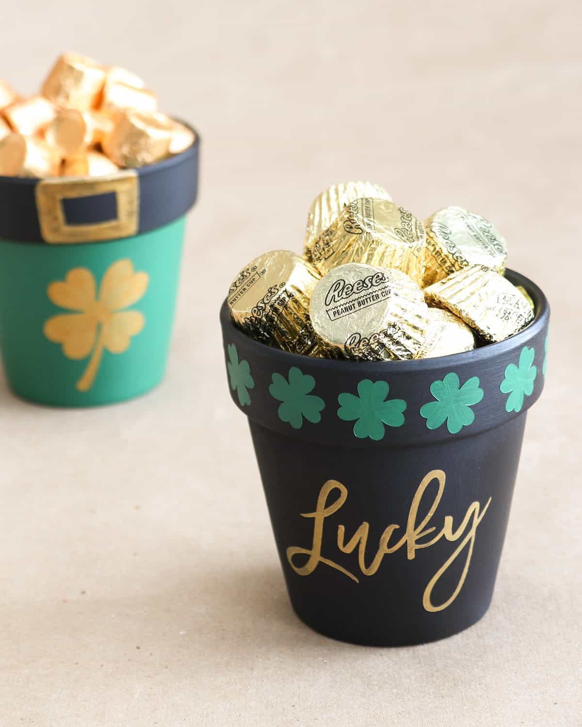 painted lucky pot of gold craft filled with gold wrapped reese's