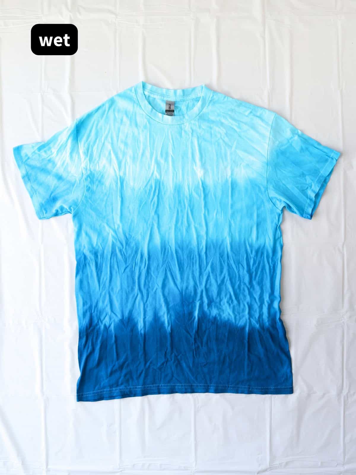 DIY blue ombré tie dye shirt with horizontal stripes