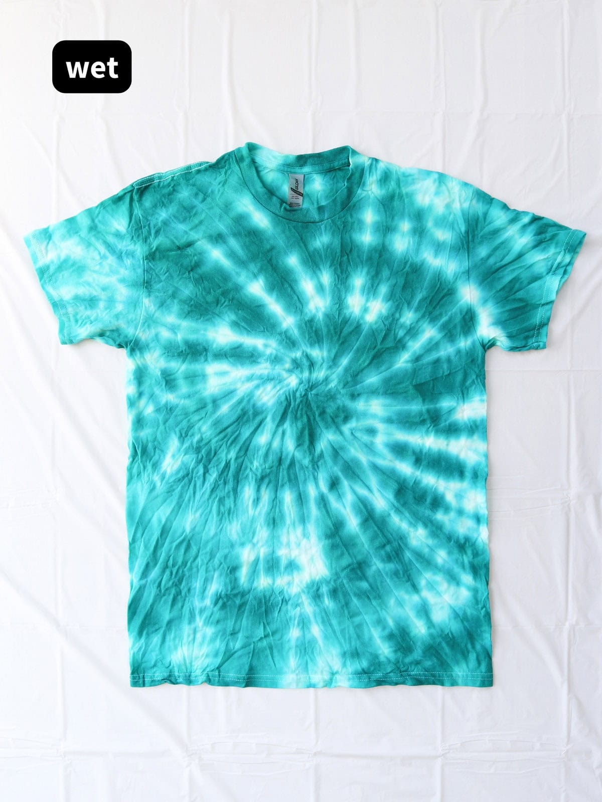 single color spiral tie dye shirt before rinsing