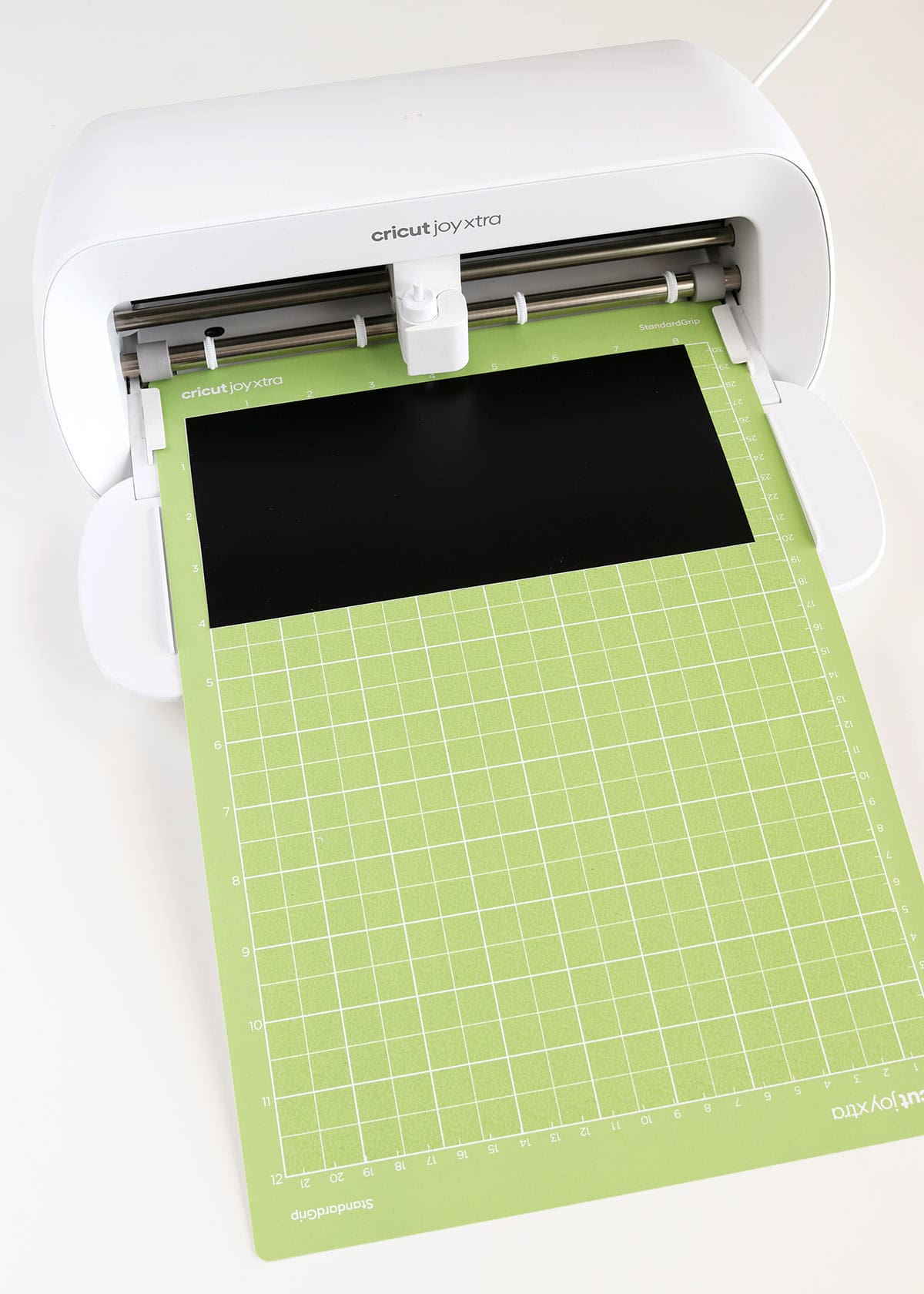 cutting vinyl on Cricut Joy Xtra for DIY vinyl Christmas ornaments