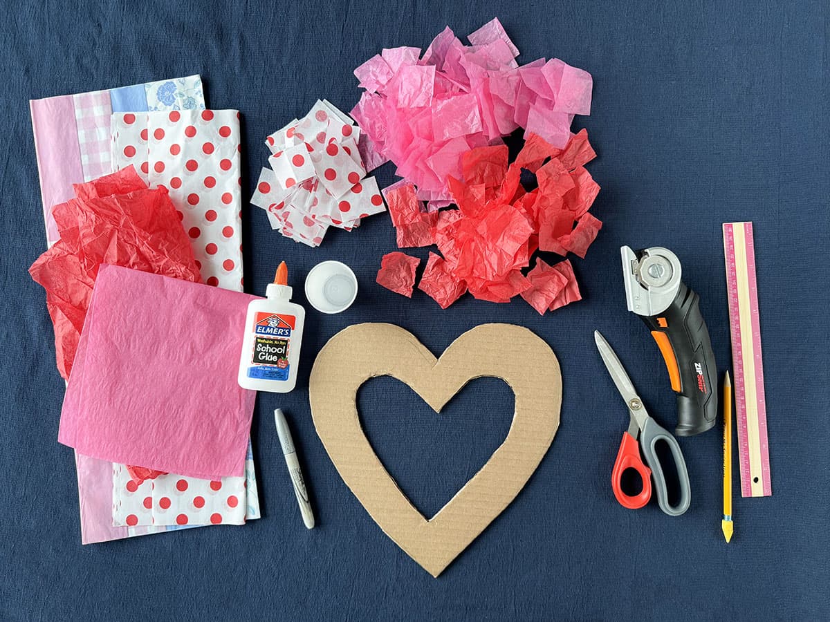 supplies needed to make a tissue paper heart wreath for valentines out of cardboard and tissue paper