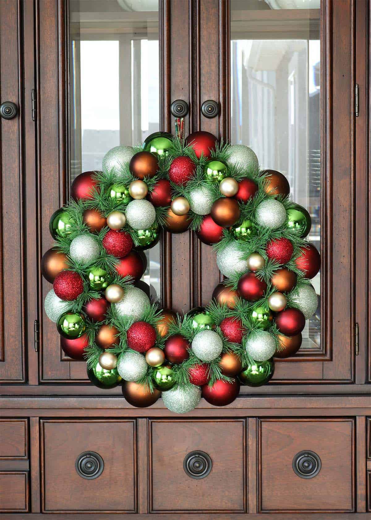 red green bronze and gold ornament wreath diy Christmas ornament wreath tutorial
