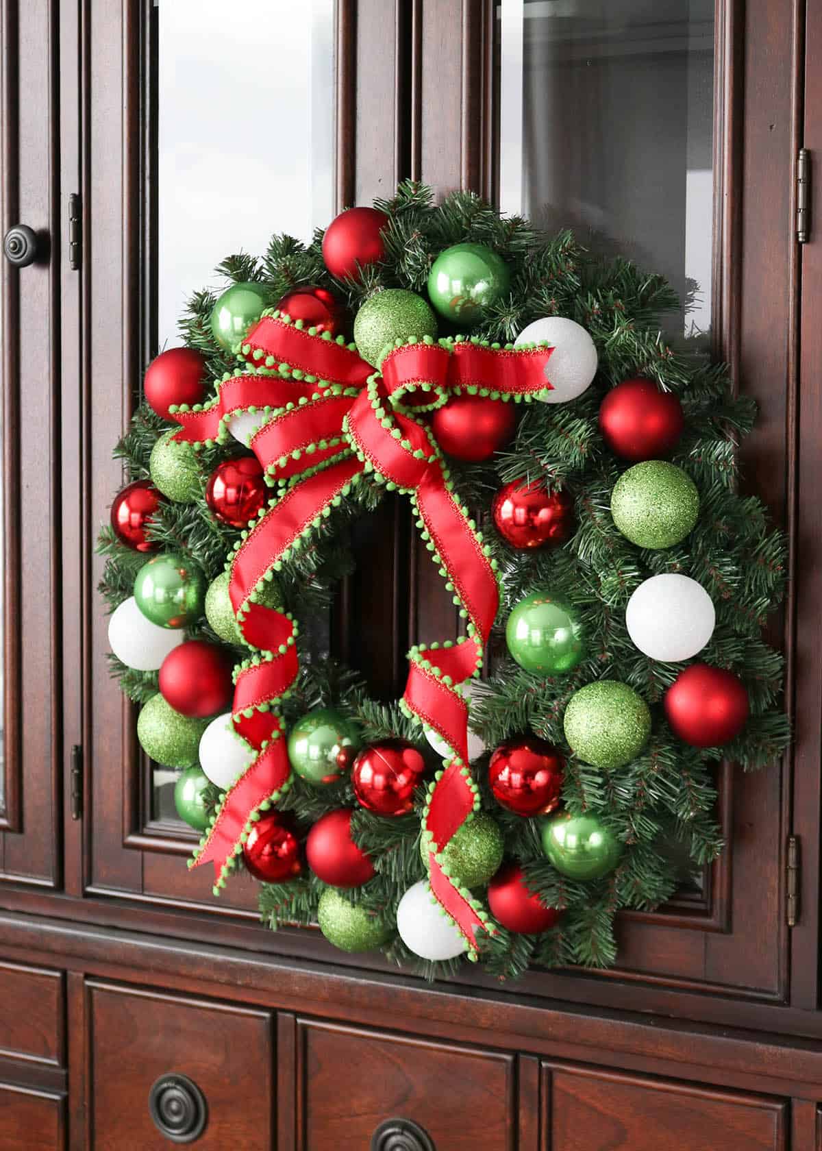 diy ornament wreath tutorial with ribbon bow